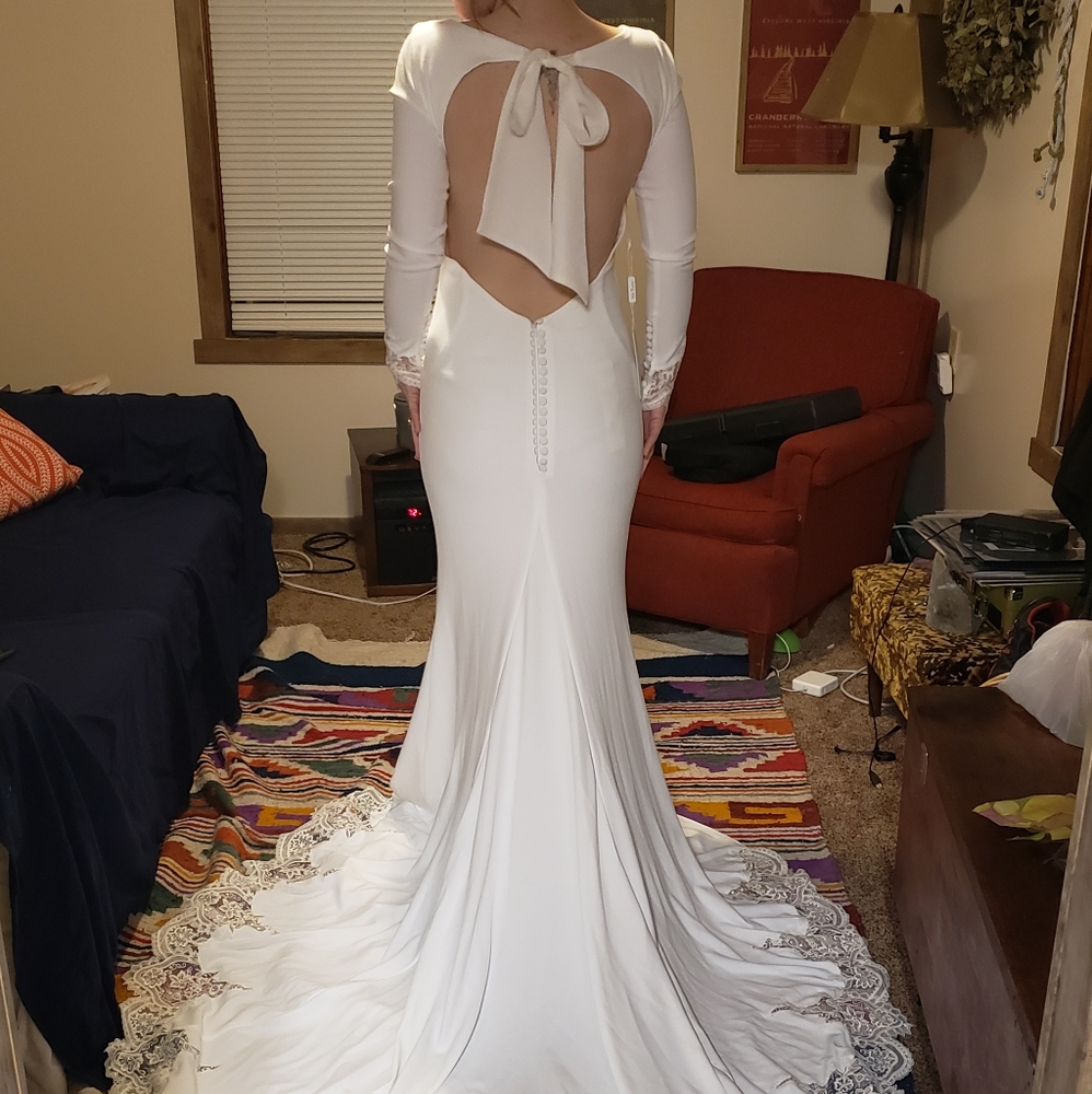 Sheath backless wedding gown, never worn